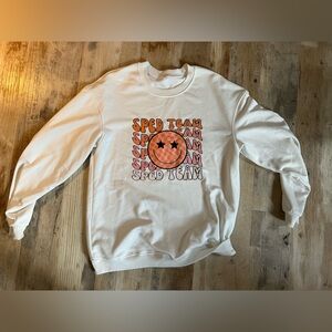 White Crew Neck Sweater with Orange Graphic sped teacher